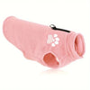 A pink cozy fleece dog sweater with a black zipper and paw print embroidery.