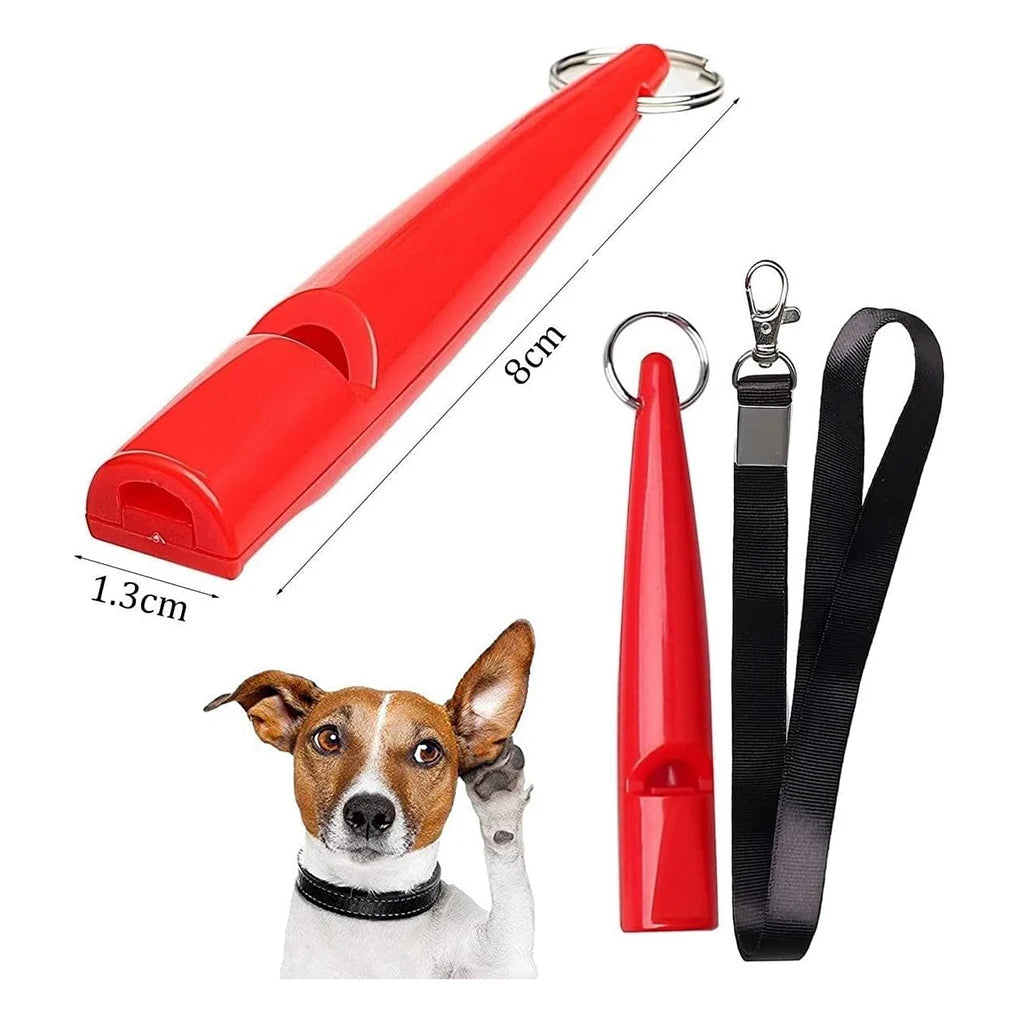 A red ultrasonic dog training whistle with a lanyard is shown next to a small dog.