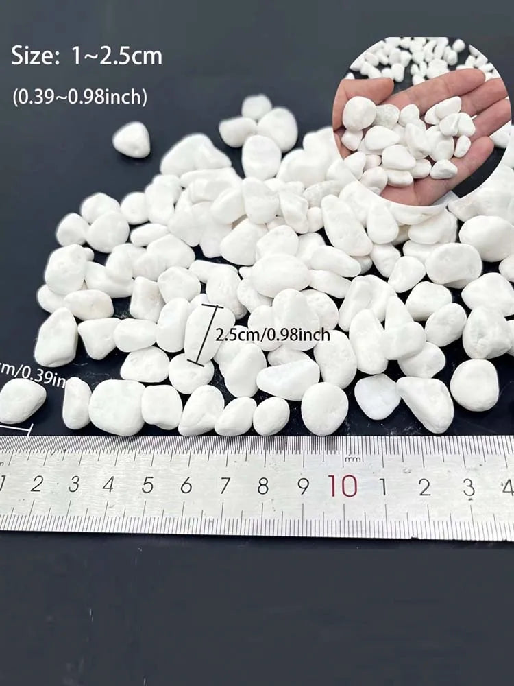 A pile of natural white pebbles is shown next to a ruler for scale, demonstrating the size of the material.