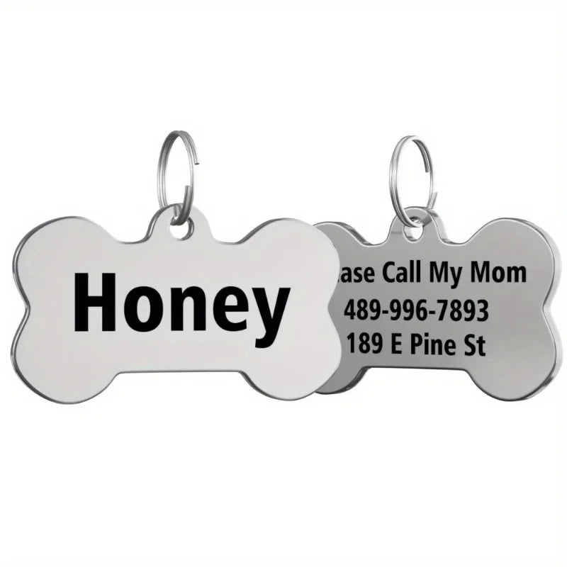 Silver bone-shaped stainless steel pet ID tag engraved with the name Honey