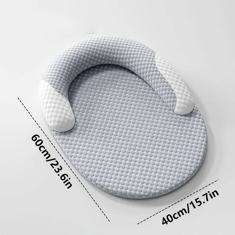 A gray breathable cooling cat bed with neck support, shown from above.