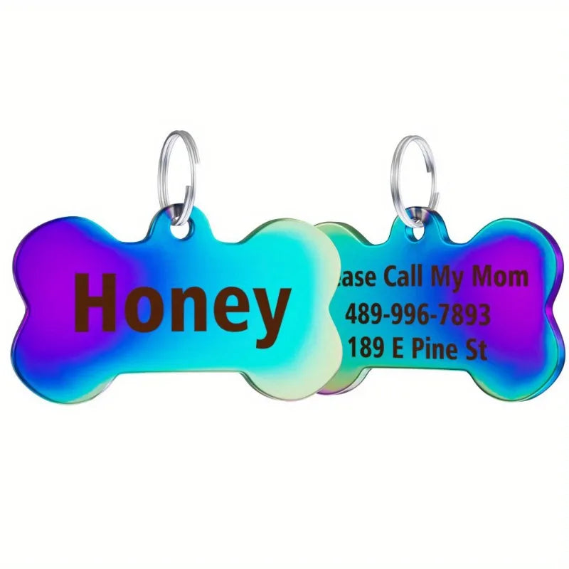 A bone-shaped stainless steel pet ID tag with a vibrant purple and blue gradient color.
