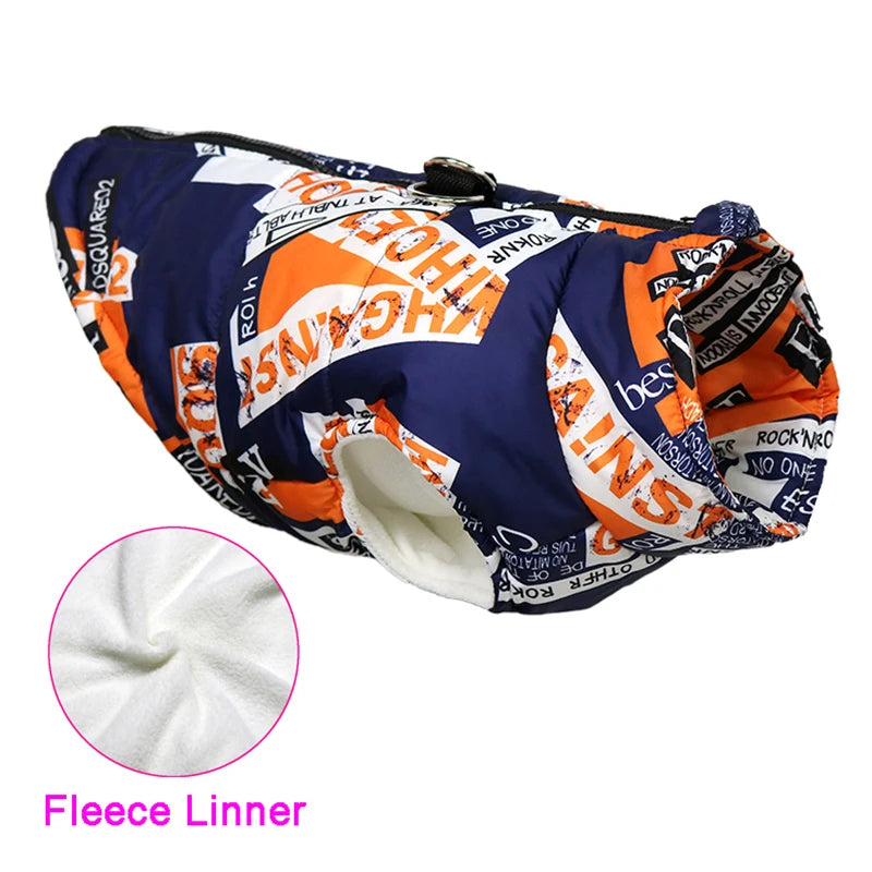 A navy blue and orange padded dog jacket with a fleece inner lining.