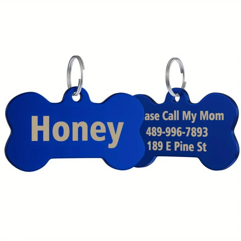 Blue bone-shaped stainless steel pet ID tag with the name Honey and contact information engraved.