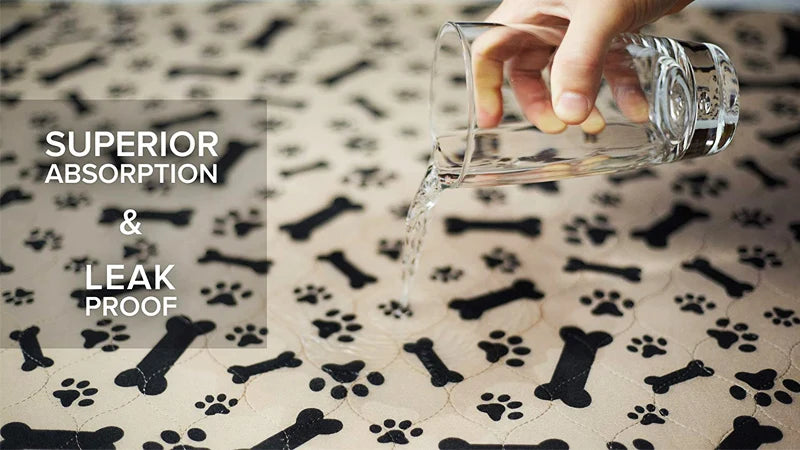A hand pours water from a glass onto a reusable dog pee pad, demonstrating superior absorption and leak proof features.
