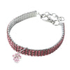 Silver collar with a rhinestone pendant shaped like a cat and a chain clasp.