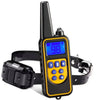 A black remote control dog training collar with a yellow display and strap.