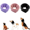 Three colored soundproof dog ear muffs in purple, pink, and black shown next to dogs.
