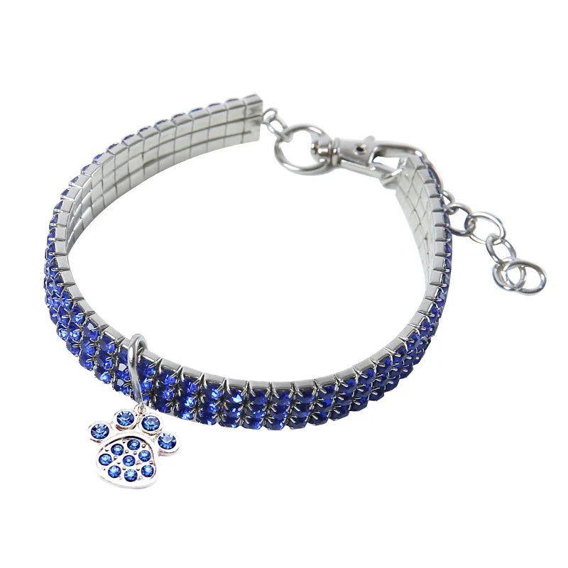 Silver rhinestone collar with a pendant shaped like a cat paw print