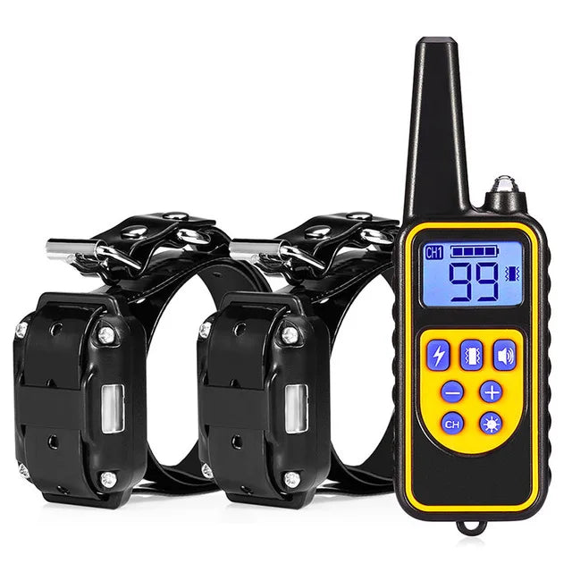 A black remote control dog training collar with a yellow display and buttons.