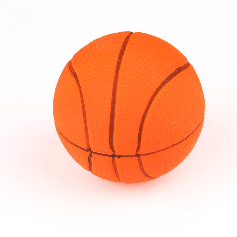 An orange, textured rubber ball used for dog training and interactive fetch.