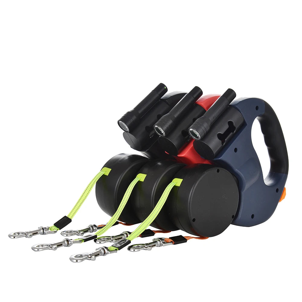 A set of black and blue retractable dog leashes with reflective nylon cords shown against a white background.