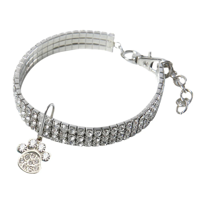 Silver rhinestone collar and pendant featuring a sparkling cat charm