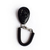 Black pet training clicker with a metal wrist strap attached.