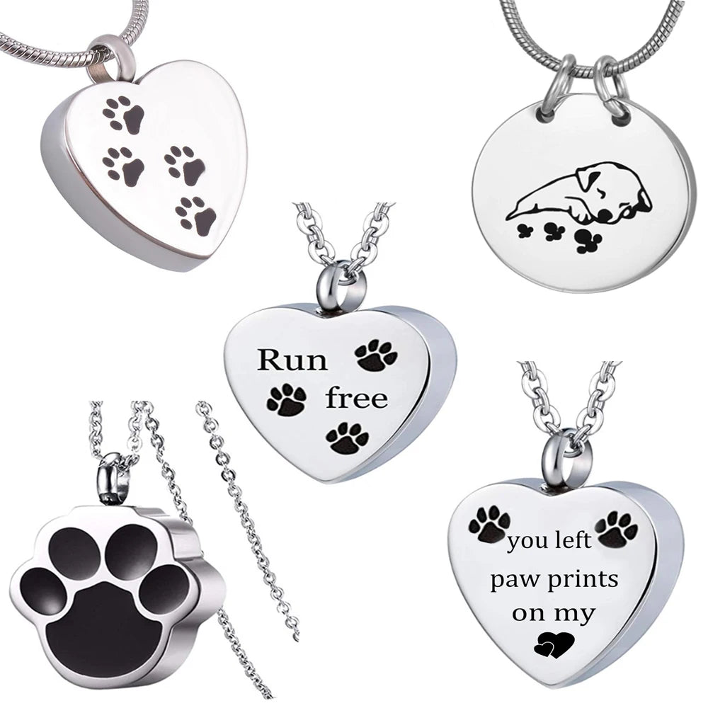 Stainless steel pet memorial necklace featuring paw prints on a heart-shaped pendant.