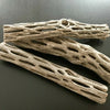 A piece of natural cholla cactus wood used as a shrimp nest for aquariums.