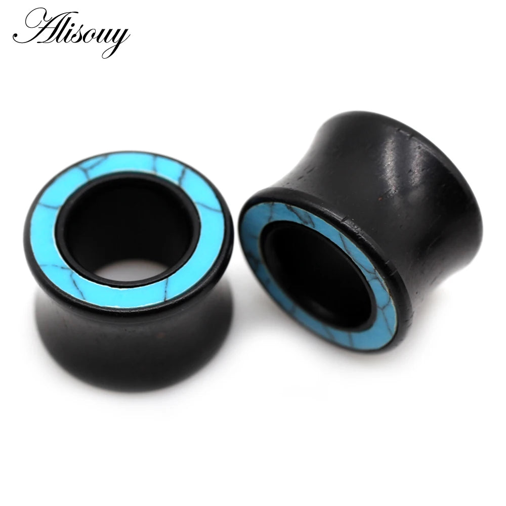 Black wood ear tunnels with a bright blue stone inlay.