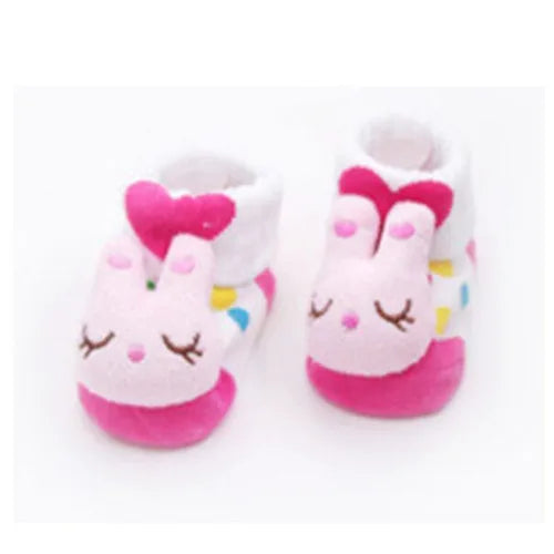 Pair of pink and white fuzzy rabbit cartoon baby socks for toddlers