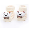 Pair of cute animal cartoon baby socks for toddlers in cream color