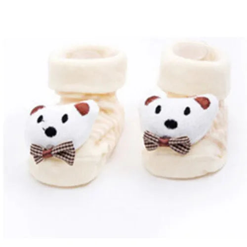 Pair of cute animal cartoon baby socks for toddlers in cream color