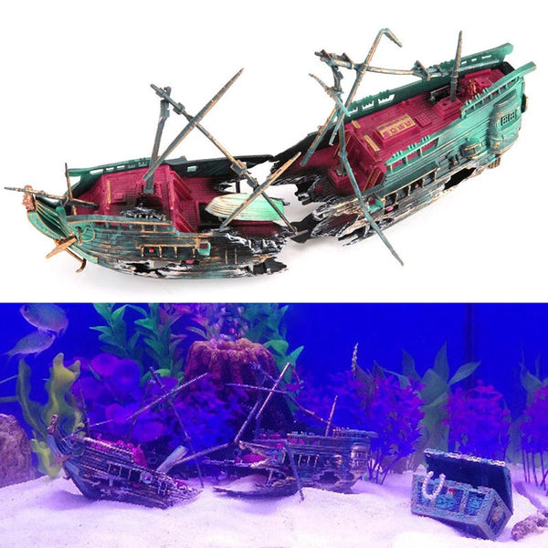 A detailed model of a sailing ship with masts and rigging, featuring weathered wood and vibrant red and green paint.