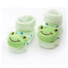 A pair of light green animal cartoon baby socks for toddlers with a smiling frog design.
