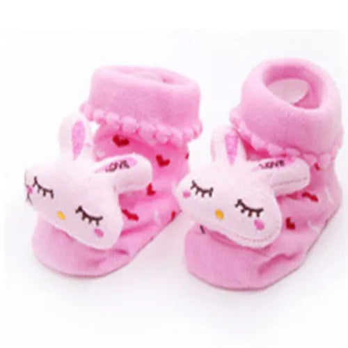Pair of pink fuzzy animal cartoon baby socks for toddlers