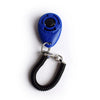 Blue pet training clicker with a black tip attached to a silver chain and black wrist strap.