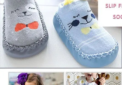 Pair of cute animal cartoon baby socks featuring a gray and blue design with a bow detail.