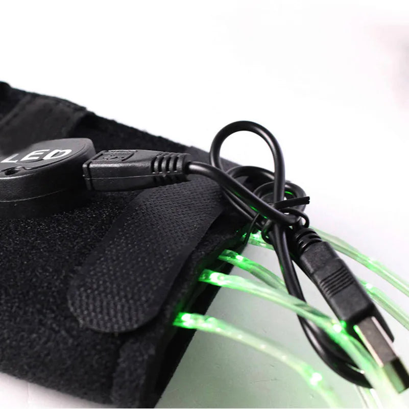 A black LED horse tail light with a flexible wire connects to a power source.