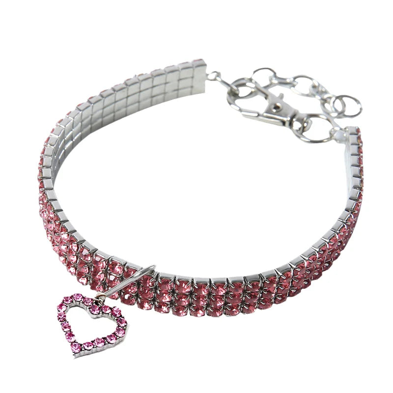 Elegant rhinestone pendant cat collar featuring a sparkling charm and silver clasp.