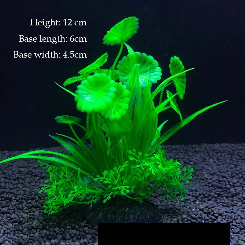 A vibrant green artificial aquarium plant with large leaves and a dense base, shown against a dark background.