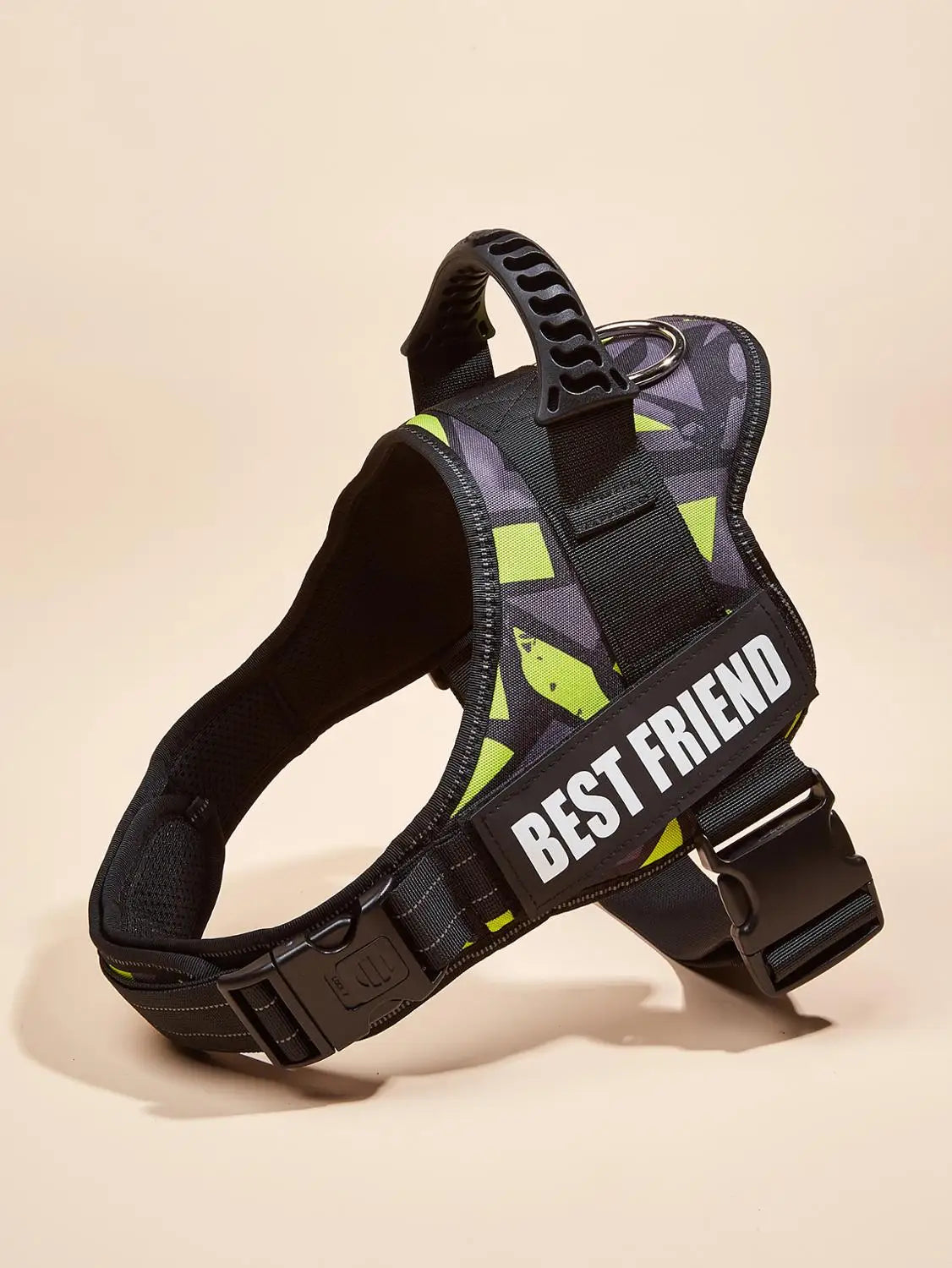 A black dog harness vest with gray and neon yellow reflective stripes and a white Best Friend logo on the strap.