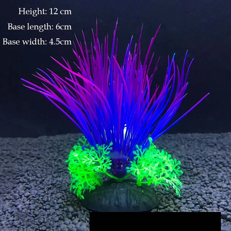 A vibrant artificial aquarium plant featuring purple and blue flowing strands on a green base.