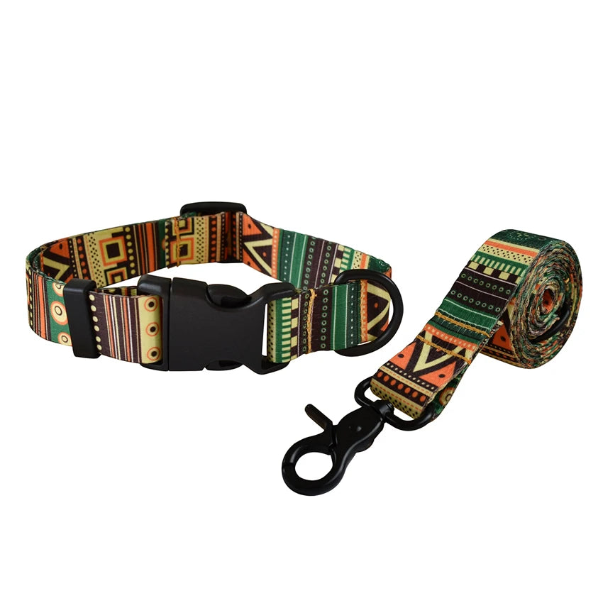 A personalized printed dog collar and leash set featuring multicolored patterned fabric.