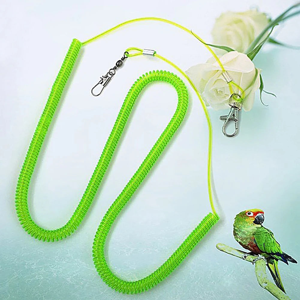 A bright lime green leash for parrot training is shown with a floral element and a small green bird.