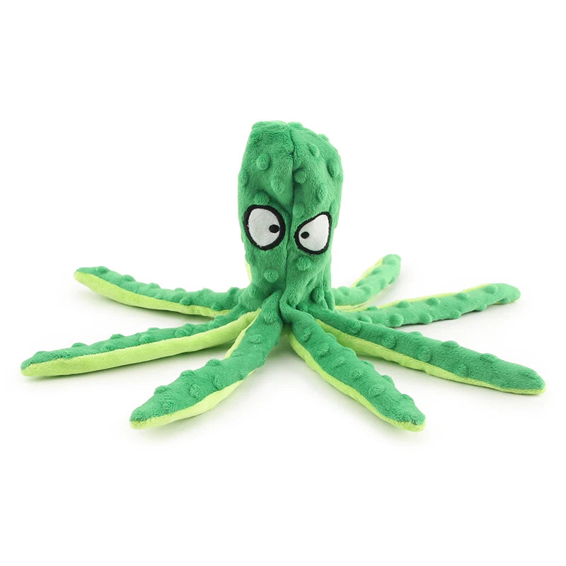 A bright green, squishy, interactive squeak dog toy shaped like a sea creature or plant.