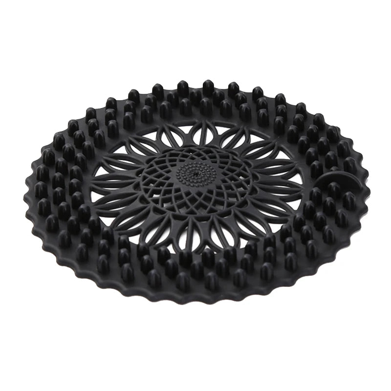 Black flexible silicone drain cover with a handle for hair and debris