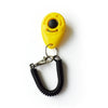 Yellow pet training clicker with a black sensor and a metal wrist strap attached.