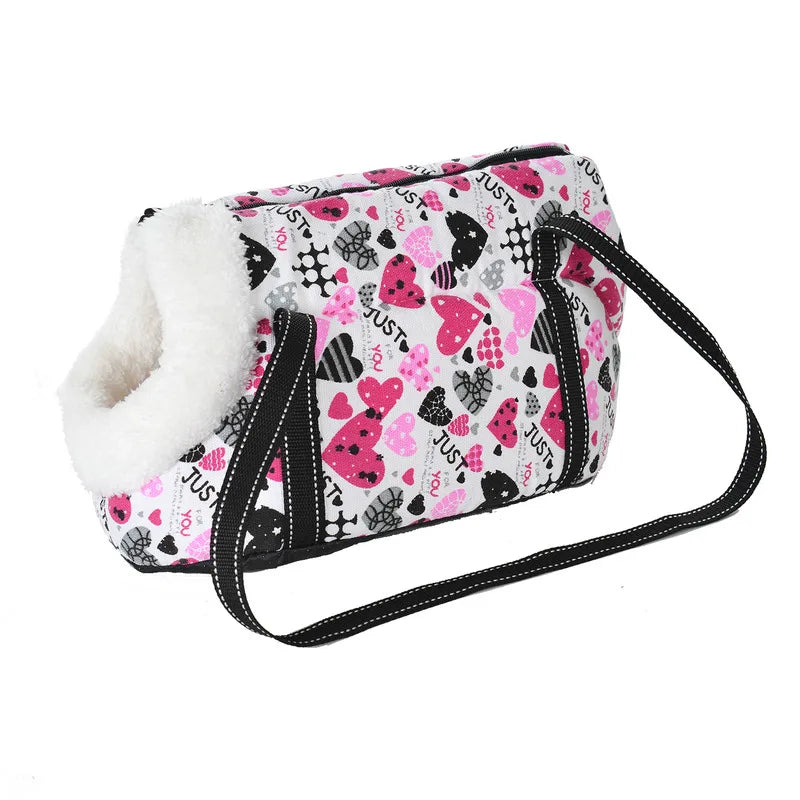 Pink- und schwarz gemustertes Cabrio-Tiertransport-Rucksack mit weißem Kunstfellfutter.