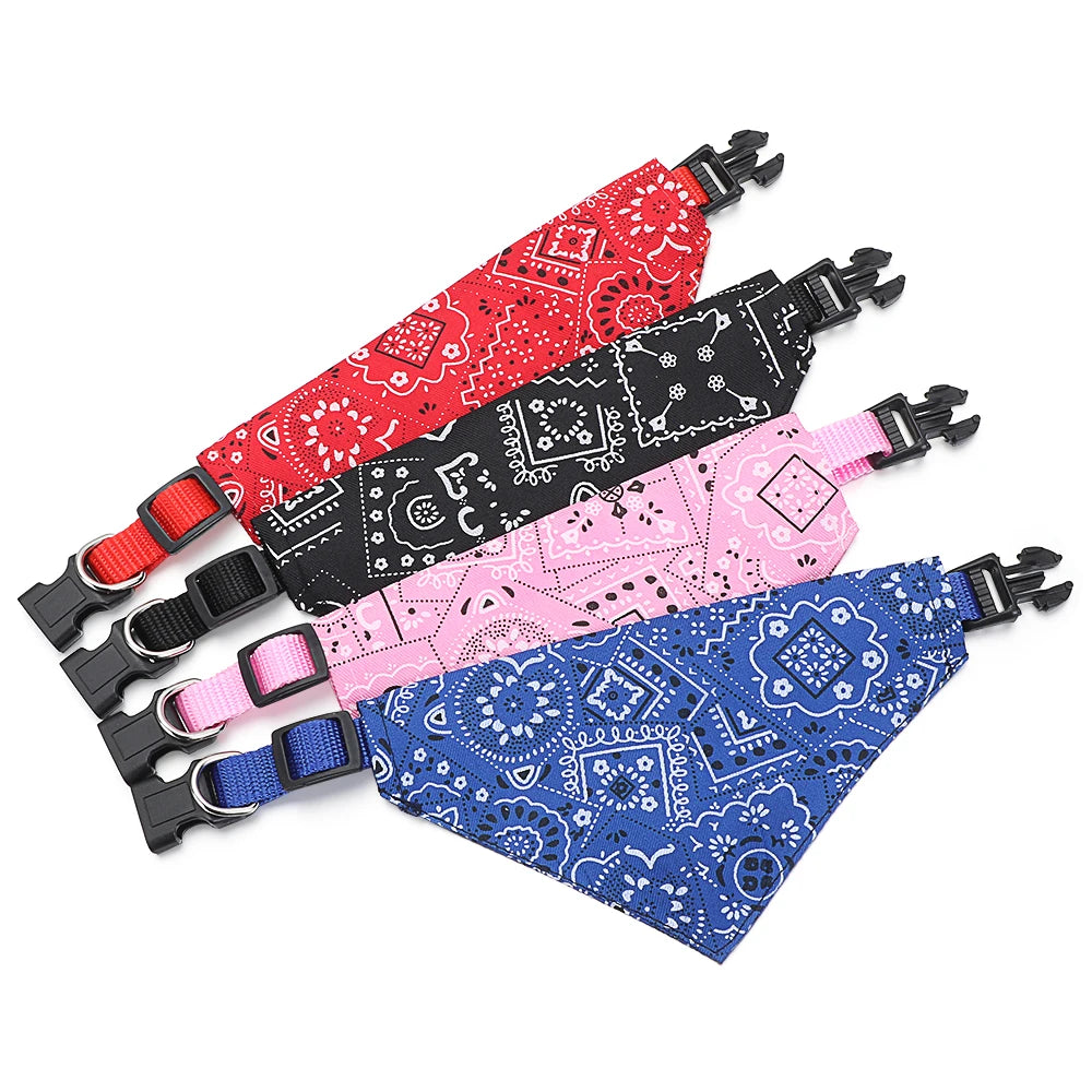 A set of three adjustable cotton pet bandanas featuring red, black, and blue paisley patterns for cats and small dogs.