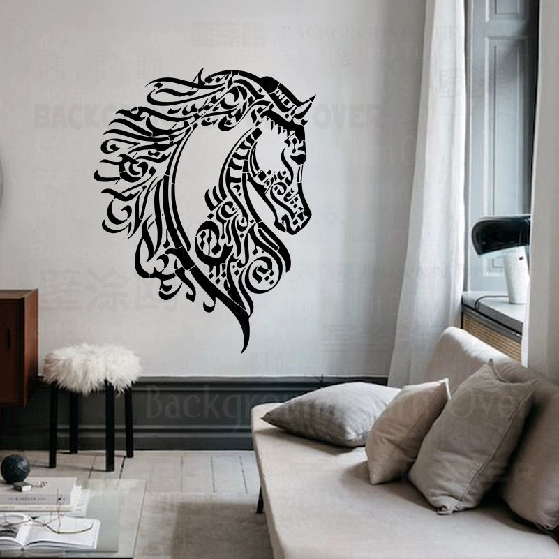 Stencil design of black Arabic horse calligraphy on a white wall