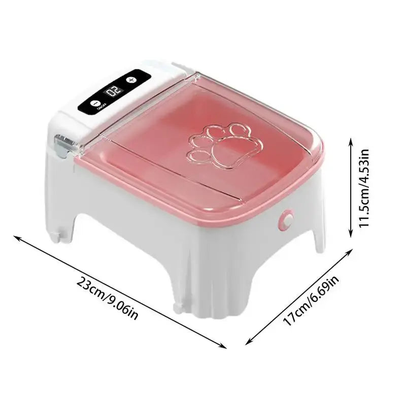 A white smart sensor pet feeder with a pink dispensing tray and a paw print design.
