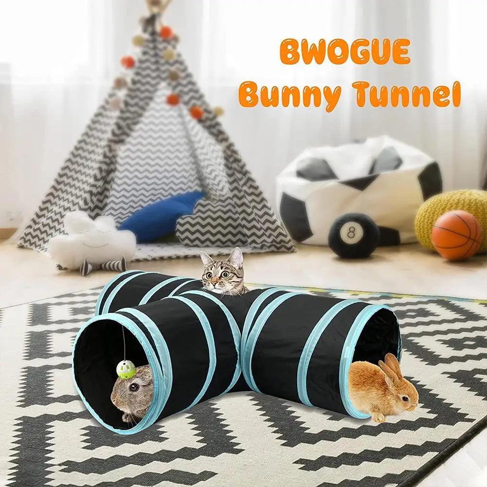 A black and blue collapsible bunny tunnel and hideout for small pets is shown on a rug with a rabbit emerging from the entran