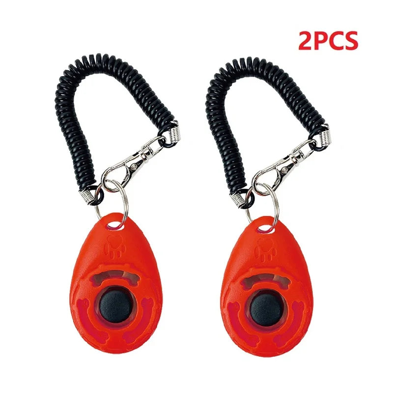 Deux jouets de dressage pour chiens ergonomiques orange avec des bracelets de poignet noirs
