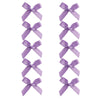 A set of purple ribbon bow hair clips for girls