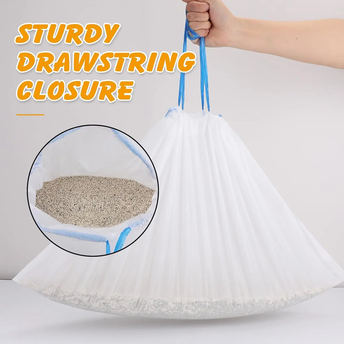 A white drawstring closure litter box liner is shown being held by a hand, highlighting its sturdy construction.