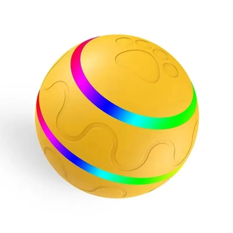 A bright yellow spherical pet ball with glowing pink and blue LED light rings.