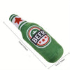 Green beer bottle shaped squeaky dog toy with a red star design