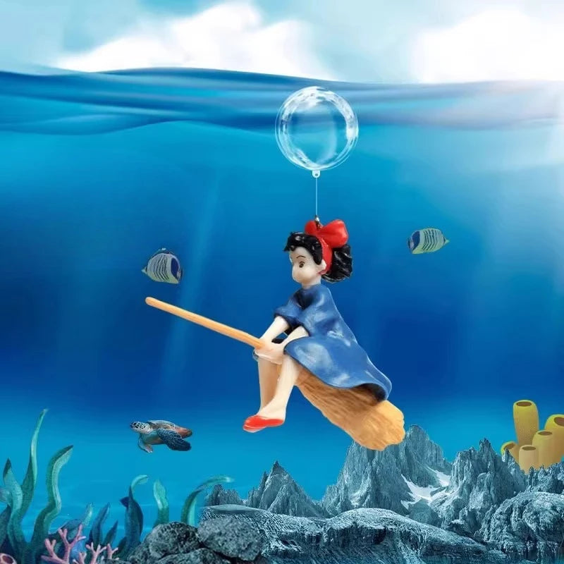 A mermaid figure is floating underwater with transparent line ornaments and a wooden stick.